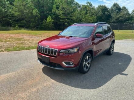 Червоний Джип Cherokee, об'ємом двигуна 2 л та пробігом 64 тис. км за 5500 $, фото 1 на Automoto.ua