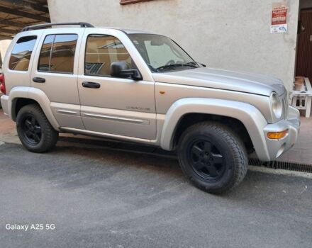 Сірий Джип Cherokee, об'ємом двигуна 10 л та пробігом 3 тис. км за 3373 $, фото 1 на Automoto.ua