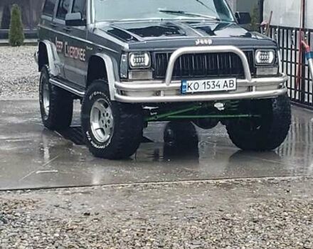 Сірий Джип Cherokee, об'ємом двигуна 3.96 л та пробігом 390 тис. км за 6850 $, фото 1 на Automoto.ua