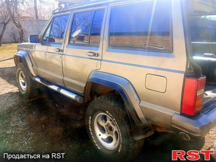 Серый Джип Чероки, объемом двигателя 40 л и пробегом 250 тыс. км за 6400 $, фото 1 на Automoto.ua