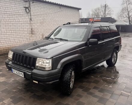 Серый Джип Чероки, объемом двигателя 4 л и пробегом 350 тыс. км за 3700 $, фото 1 на Automoto.ua