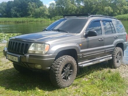Сірий Джип Cherokee, об'ємом двигуна 4.7 л та пробігом 470 тис. км за 7006 $, фото 1 на Automoto.ua