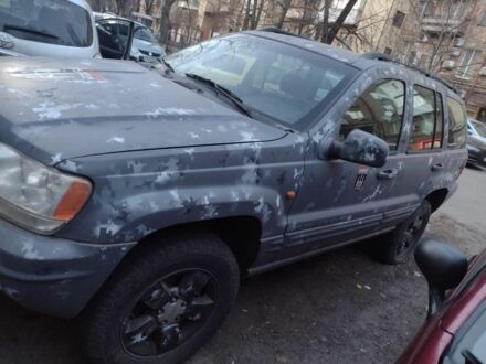 Сірий Джип Cherokee, об'ємом двигуна 3.1 л та пробігом 260 тис. км за 3908 $, фото 1 на Automoto.ua