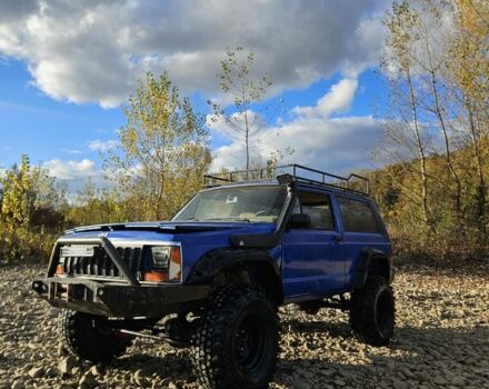 Синий Джип Чероки, объемом двигателя 2.5 л и пробегом 100 тыс. км за 6999 $, фото 1 на Automoto.ua