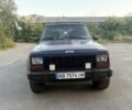 Синий Джип Чероки, объемом двигателя 2.5 л и пробегом 250 тыс. км за 3450 $, фото 1 на Automoto.ua