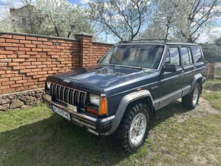 Синій Джип Cherokee, об'ємом двигуна 4 л та пробігом 324 тис. км за 7300 $, фото 1 на Automoto.ua