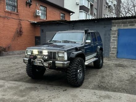 Синий Джип Чероки, объемом двигателя 3 л и пробегом 100 тыс. км за 7200 $, фото 1 на Automoto.ua