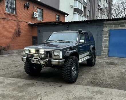 Синій Джип Cherokee, об'ємом двигуна 3 л та пробігом 100 тис. км за 7200 $, фото 1 на Automoto.ua