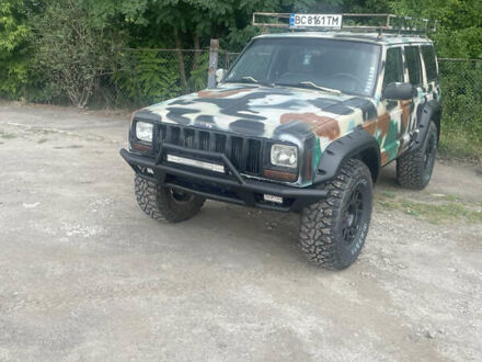 Синий Джип Чероки, объемом двигателя 2.5 л и пробегом 235 тыс. км за 12600 $, фото 1 на Automoto.ua