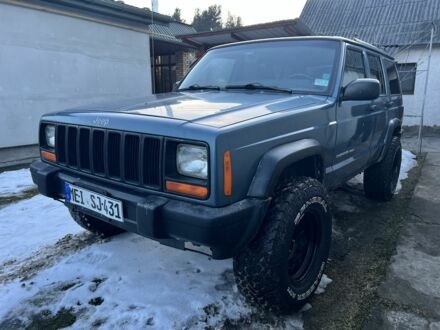 Синій Джип Cherokee, об'ємом двигуна 4 л та пробігом 260 тис. км за 1700 $, фото 1 на Automoto.ua