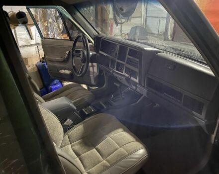 Зеленый Джип Чероки, объемом двигателя 4 л и пробегом 390 тыс. км за 6500 $, фото 1 на Automoto.ua