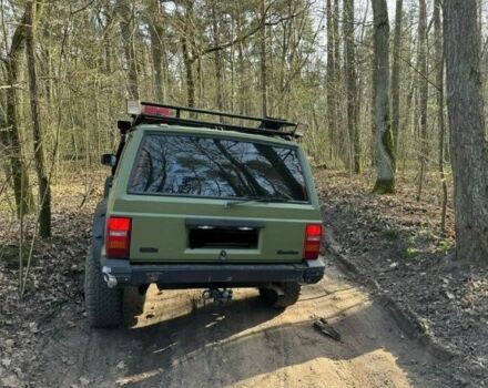 Зелений Джип Cherokee, об'ємом двигуна 4 л та пробігом 244 тис. км за 9500 $, фото 2 на Automoto.ua