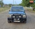 Зеленый Джип Чероки, объемом двигателя 4 л и пробегом 247 тыс. км за 6800 $, фото 3 на Automoto.ua
