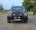 Зеленый Джип Чероки, объемом двигателя 4 л и пробегом 247 тыс. км за 5850 $, фото 1 на Automoto.ua