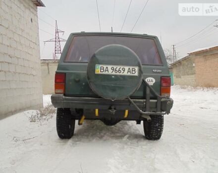 Зеленый Джип Чероки, объемом двигателя 4 л и пробегом 215 тыс. км за 6500 $, фото 3 на Automoto.ua