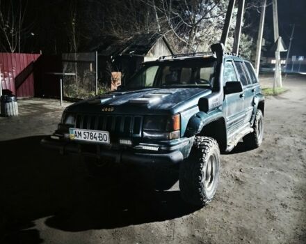 Зелений Джип Cherokee, об'ємом двигуна 5.2 л та пробігом 250 тис. км за 4500 $, фото 1 на Automoto.ua