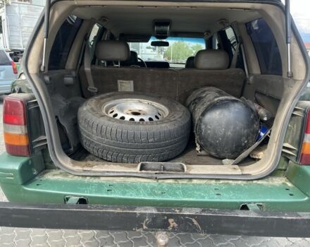 Зеленый Джип Чероки, объемом двигателя 5.2 л и пробегом 360 тыс. км за 5700 $, фото 11 на Automoto.ua