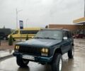 Зеленый Джип Чероки, объемом двигателя 4 л и пробегом 230 тыс. км за 4750 $, фото 1 на Automoto.ua