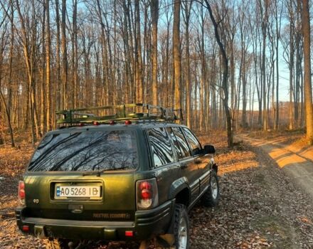 Зелений Джип Cherokee, об'ємом двигуна 5.2 л та пробігом 326 тис. км за 6000 $, фото 3 на Automoto.ua