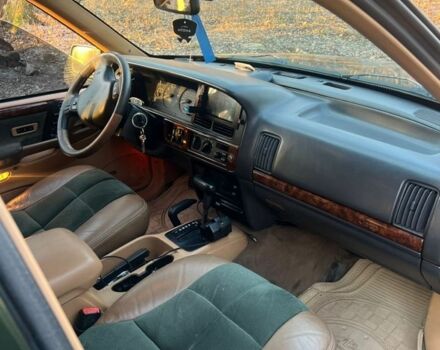 Зелений Джип Cherokee, об'ємом двигуна 5.2 л та пробігом 326 тис. км за 6000 $, фото 8 на Automoto.ua