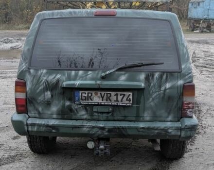 Зеленый Джип Чероки, объемом двигателя 2.5 л и пробегом 308 тыс. км за 3000 $, фото 3 на Automoto.ua