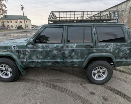 Зеленый Джип Чероки, объемом двигателя 2.5 л и пробегом 308 тыс. км за 3000 $, фото 4 на Automoto.ua