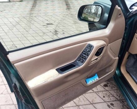 Зелений Джип Cherokee, об'ємом двигуна 4.7 л та пробігом 300 тис. км за 7000 $, фото 15 на Automoto.ua