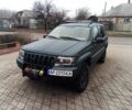 Зелений Джип Cherokee, об'ємом двигуна 4.7 л та пробігом 300 тис. км за 7000 $, фото 1 на Automoto.ua