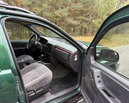 Зеленый Джип Чероки, объемом двигателя 3.1 л и пробегом 285 тыс. км за 3950 $, фото 9 на Automoto.ua