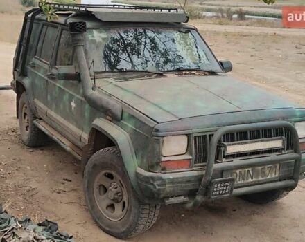 Зелений Джип Cherokee, об'ємом двигуна 2.5 л та пробігом 300 тис. км за 2000 $, фото 1 на Automoto.ua