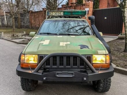 Зелений Джип Cherokee, об'ємом двигуна 0 л та пробігом 450 тис. км за 200000 $, фото 1 на Automoto.ua