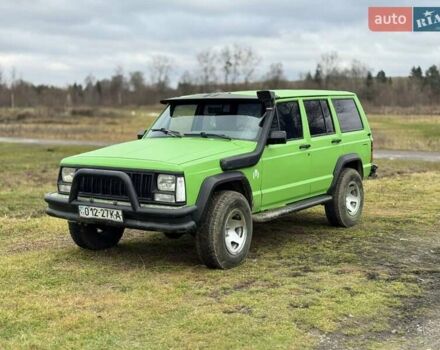 Зеленый Джип Чероки, объемом двигателя 4 л и пробегом 201 тыс. км за 5250 $, фото 1 на Automoto.ua