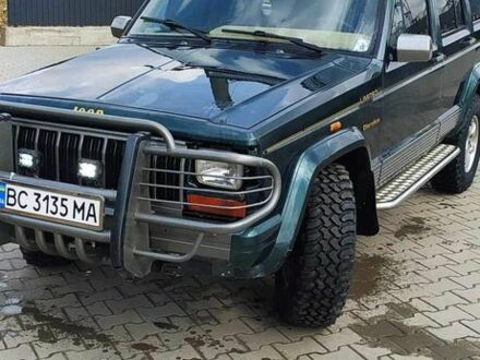 Зелений Джип Cherokee, об'ємом двигуна 4 л та пробігом 287 тис. км за 5600 $, фото 1 на Automoto.ua