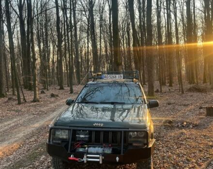 Зелений Джип Cherokee, об'ємом двигуна 5.2 л та пробігом 326 тис. км за 6000 $, фото 1 на Automoto.ua