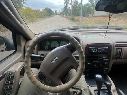 Зеленый Джип Чероки, объемом двигателя 2.7 л и пробегом 370 тыс. км за 5700 $, фото 1 на Automoto.ua