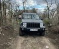 Черный Джип Коммандер, объемом двигателя 3 л и пробегом 330 тыс. км за 7200 $, фото 1 на Automoto.ua