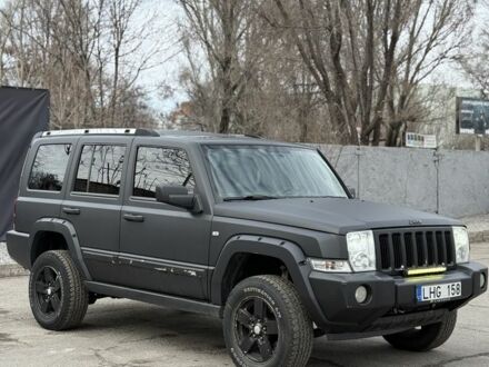 Черный Джип Коммандер, объемом двигателя 3 л и пробегом 300 тыс. км за 5600 $, фото 1 на Automoto.ua