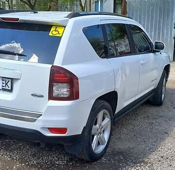 Білий Джип Compass, об'ємом двигуна 2 л та пробігом 220 тис. км за 10000 $, фото 3 на Automoto.ua