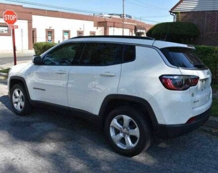 Білий Джип Compass, об'ємом двигуна 2.4 л та пробігом 62 тис. км за 6200 $, фото 2 на Automoto.ua