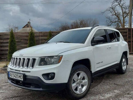 Білий Джип Compass, об'ємом двигуна 2 л та пробігом 148 тис. км за 9990 $, фото 1 на Automoto.ua
