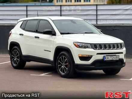 Білий Джип Compass, об'ємом двигуна 2.4 л та пробігом 203 тис. км за 13500 $, фото 1 на Automoto.ua