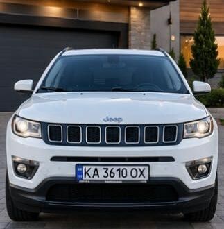 Білий Джип Compass, об'ємом двигуна 2.4 л та пробігом 136 тис. км за 14170 $, фото 1 на Automoto.ua