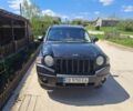 Черный Джип Компас, объемом двигателя 2 л и пробегом 260 тыс. км за 5800 $, фото 1 на Automoto.ua