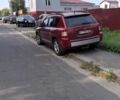Червоний Джип Compass, об'ємом двигуна 2.4 л та пробігом 165 тис. км за 6999 $, фото 1 на Automoto.ua
