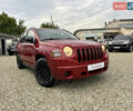 Червоний Джип Compass, об'ємом двигуна 2 л та пробігом 214 тис. км за 7950 $, фото 1 на Automoto.ua