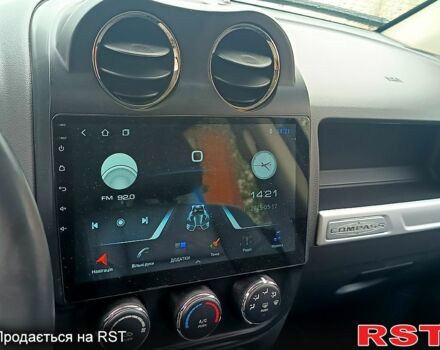 Червоний Джип Compass, об'ємом двигуна 2 л та пробігом 77 тис. км за 9800 $, фото 4 на Automoto.ua