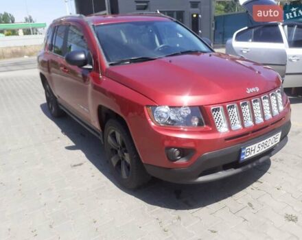 Червоний Джип Compass, об'ємом двигуна 2 л та пробігом 68 тис. км за 10800 $, фото 1 на Automoto.ua