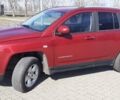 Червоний Джип Compass, об'ємом двигуна 2 л та пробігом 170 тис. км за 10200 $, фото 1 на Automoto.ua