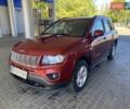 Красный Джип Компас, объемом двигателя 2 л и пробегом 170 тыс. км за 9500 $, фото 1 на Automoto.ua