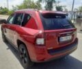 Червоний Джип Compass, об'ємом двигуна 2 л та пробігом 67 тис. км за 10700 $, фото 1 на Automoto.ua